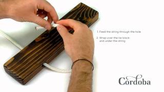 How to Change Strings on a Classical or Nylon String Guitar [upl. by Nuahsel362]