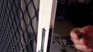 Sliding Security Doors Adjusting and Installing Rollers [upl. by Mauralia]