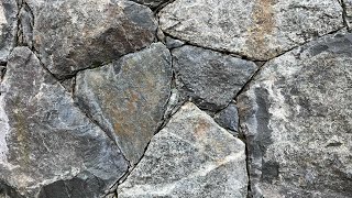 Secrets to creating a beautiful NATURAL STONE WALL Insights from a real stonemason [upl. by Yak]