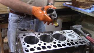 Installing Pistons in Diesel Engine [upl. by Feune]