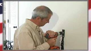 QuakeHold Universal Flat Screen Television Safety Strap Installation Video [upl. by Tempest]