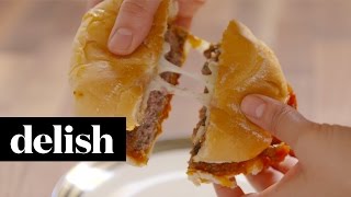 How To Make Pizza Burgers  Delish [upl. by Elleryt]