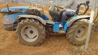 Tractores agrícolas trabajando en invernadero [upl. by Haduj]