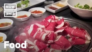 How to Properly Eat Korean BBQ  Cuisine Code  NowThis [upl. by Ahtabat]