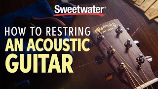 How to Restring an Acoustic Guitar [upl. by Garrot]