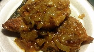 Smothered Pork Chops With Onions amp Gravy Recipe [upl. by Annasus]