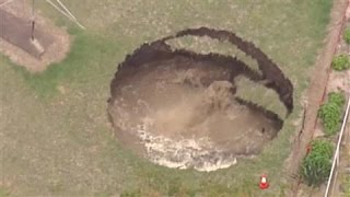 Giant Sinkhole Opens in Backyard [upl. by Amatruda512]